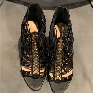 Black, high-heeled (very) shoes